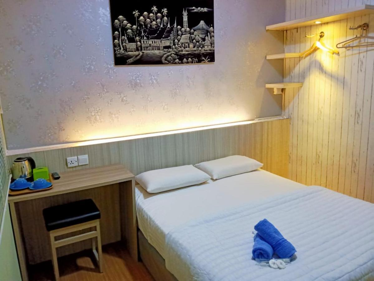 Hotel Sleeprest @ Golden Prima Batam Pokoj fotografie