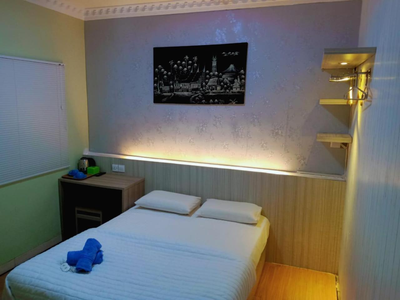 Hotel Sleeprest @ Golden Prima Batam Pokoj fotografie